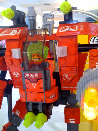 Illustration for article titled Massive Lego Mecha Can Probably Kill Humans, then Drink Ten Packs of Good Ole Fortran